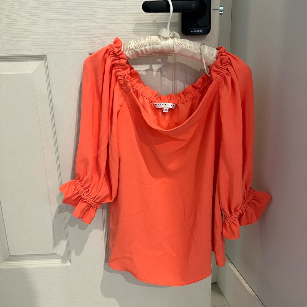 trina turke coral orange poppy off the shoulder ruched blouse equinox top